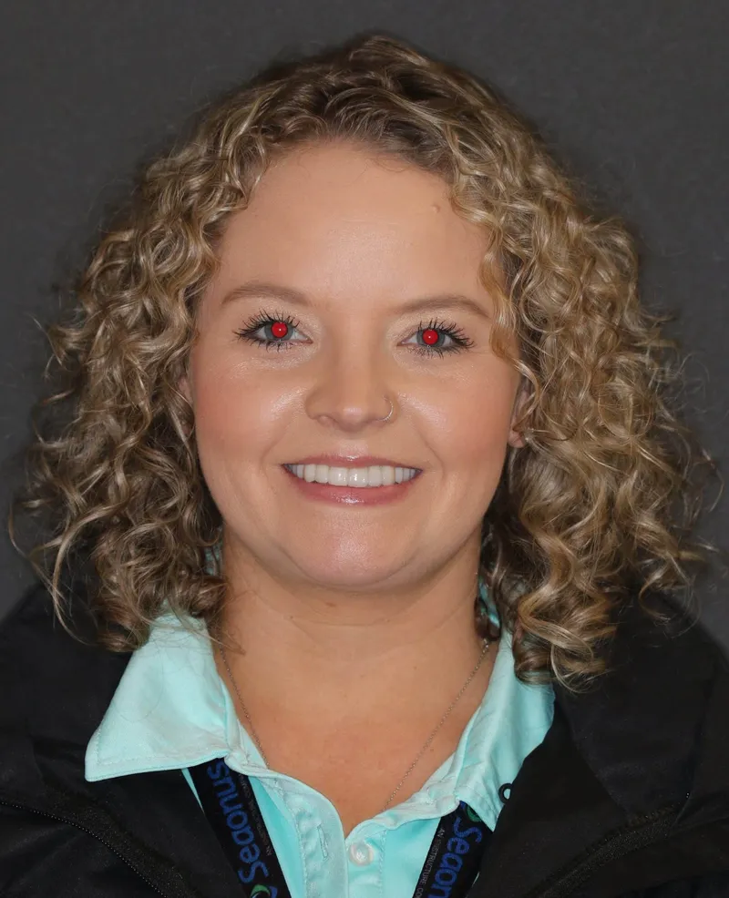 An actual Beyond Exceptional Dentistry patient smiling after her smile makeover